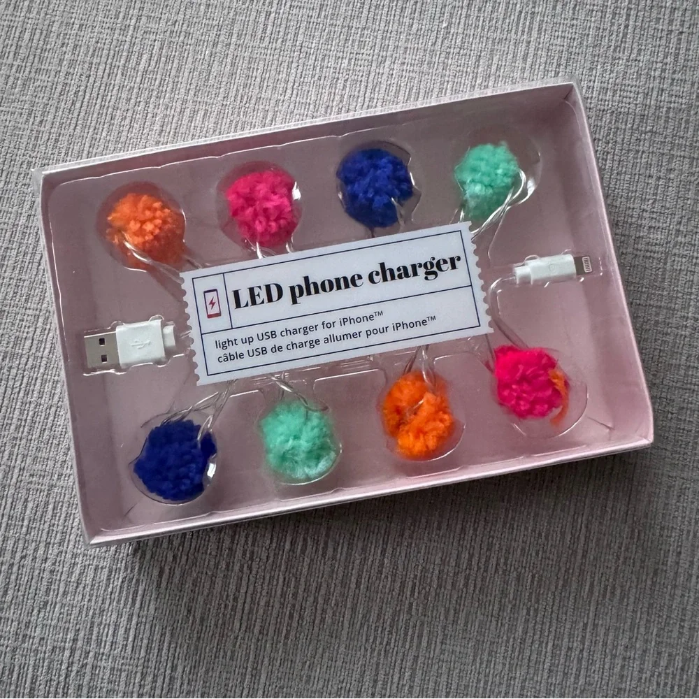 NWT LED phone charger with multicolored Pom-poms